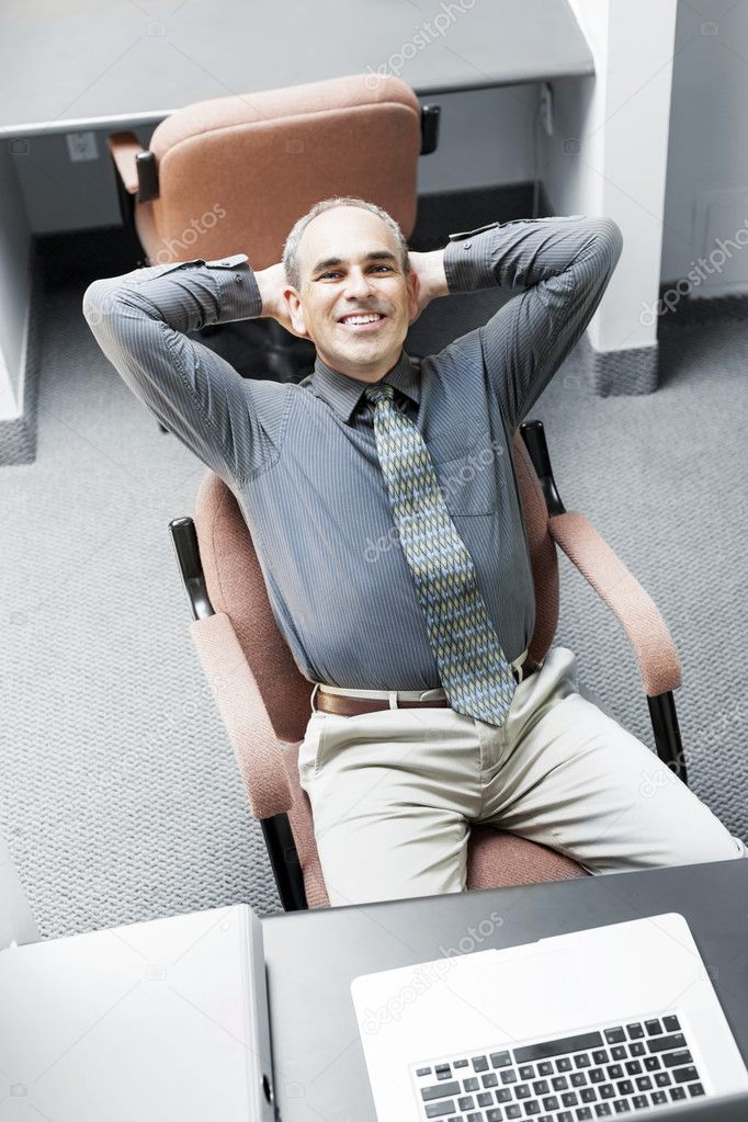 Man sitting at office desk