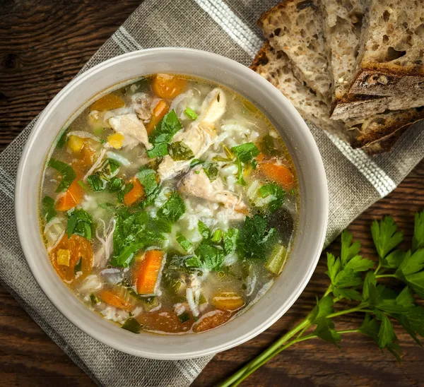 Chicken soup with rice and vegetables — Stock Photo, Image