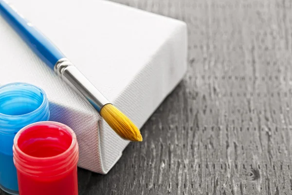 Paintbrush on canvas — Stock Photo, Image