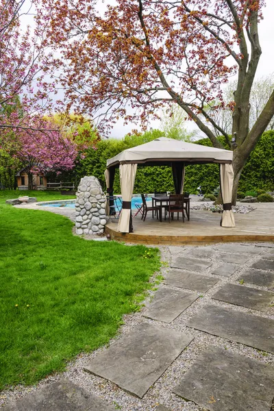 Backyard with gazebo and deck — Stock Photo, Image