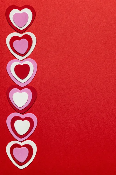 Red Valentines day background with hearts — 图库照片