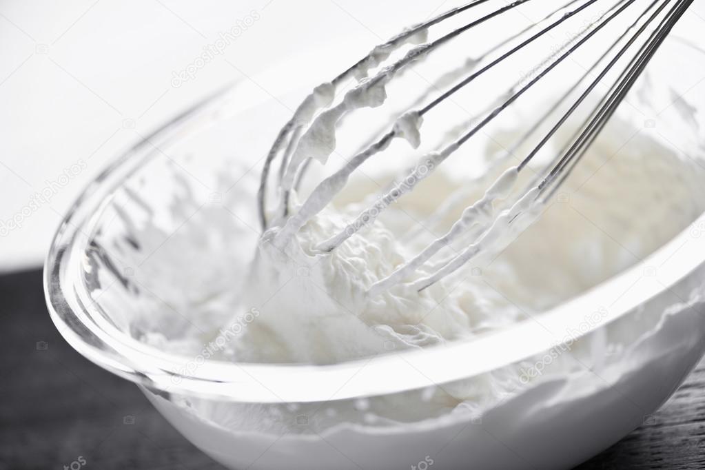 Whisk in whipped cream — Stock Photo © elenathewise 39354349