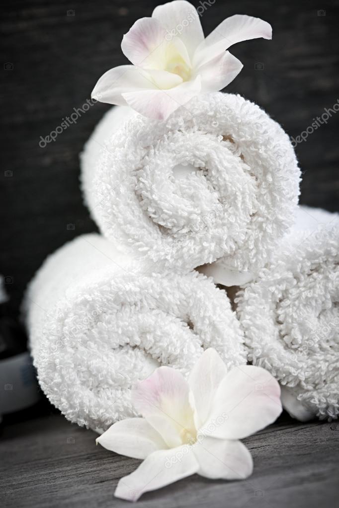 White rolled up spa towels