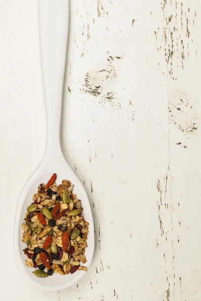 Homemade granola in spoon — Stock Photo, Image