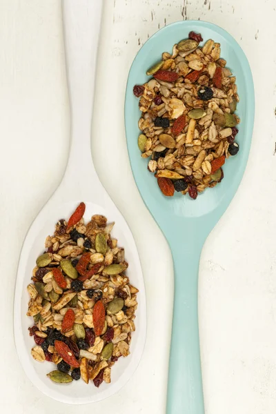Homemade granola in spoons — Stock Photo, Image