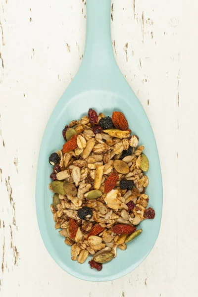 Homemade granola in spoon — Stock Photo, Image