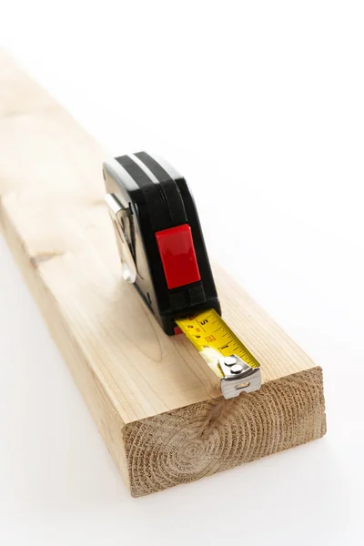 Tape measure on wood — Stock Photo, Image