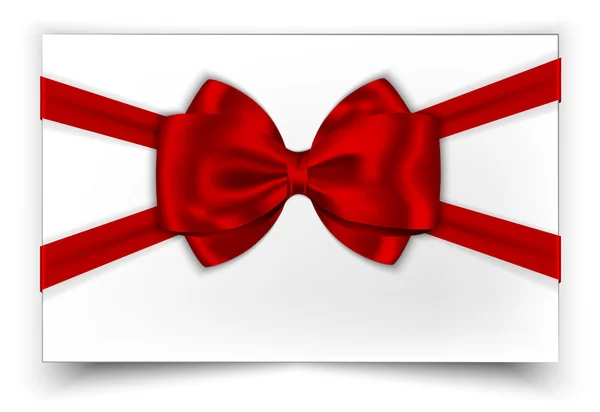 Carte cadeau blanche avec ruban rouge et noeud — Image vectorielle