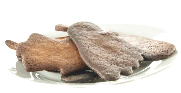 Biscotti bruciati su piastra bianca — Foto Stock