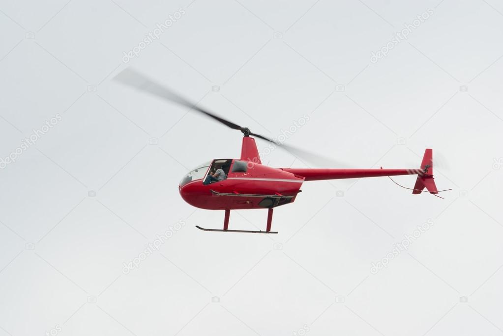 Red R-44 helicopter