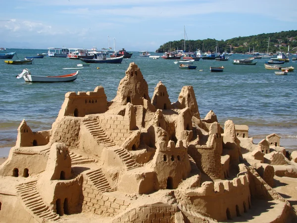 Zandkasteel op het strand Rechtenvrije Stockafbeeldingen