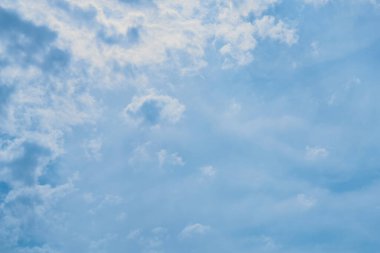    Irresistible views of  blue sky with white clouds in a light hazy haze.                            