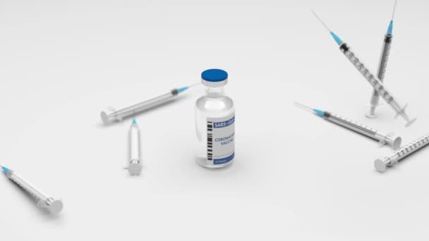 Шприцы падают вокруг бутылки с вакциной на белом фоне — стоковое видео