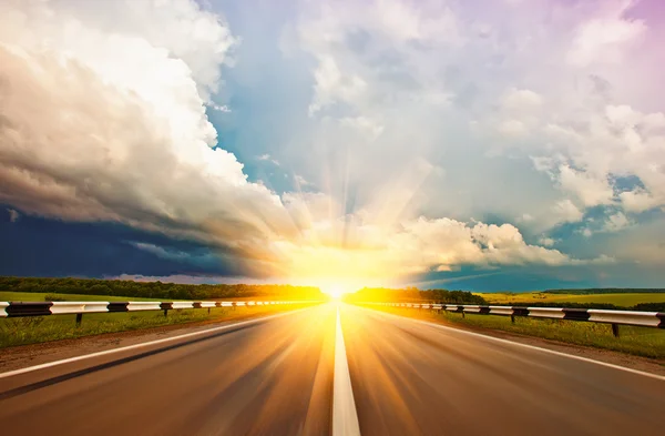 Asphalt road between fields — Stock Photo, Image