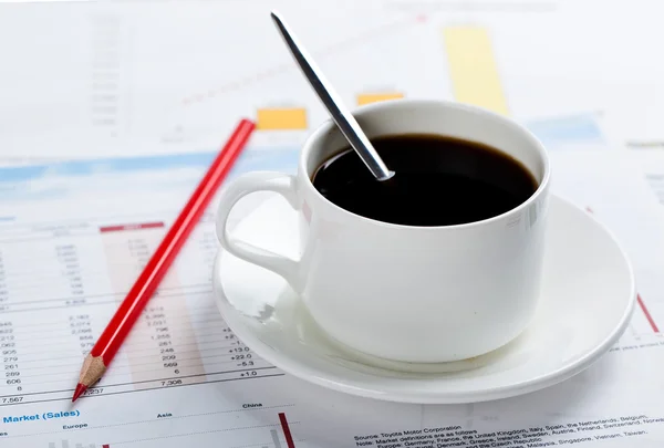 Close-up of documents, pen, cup of coffee on the table — Stock Photo, Image