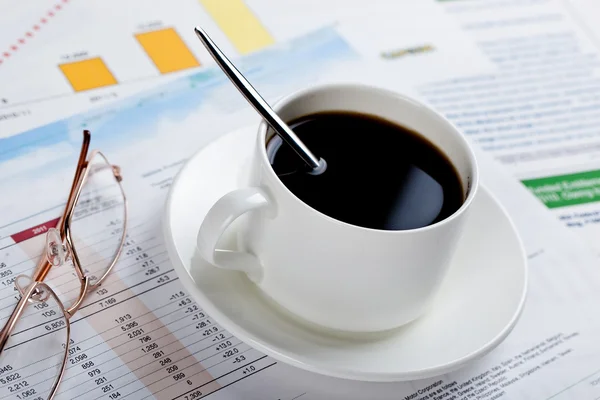 Close-up of documents, pen, cup of coffee on the table — Stock Photo, Image