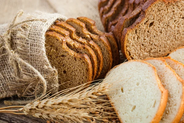 Bread and rye spikelets — Stock Photo, Image