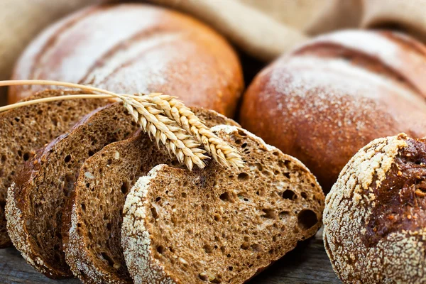 Bread and rye spikelets — Stock Photo, Image