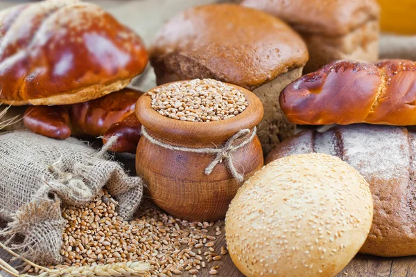 Bakery products and spikelets — Stock Photo, Image