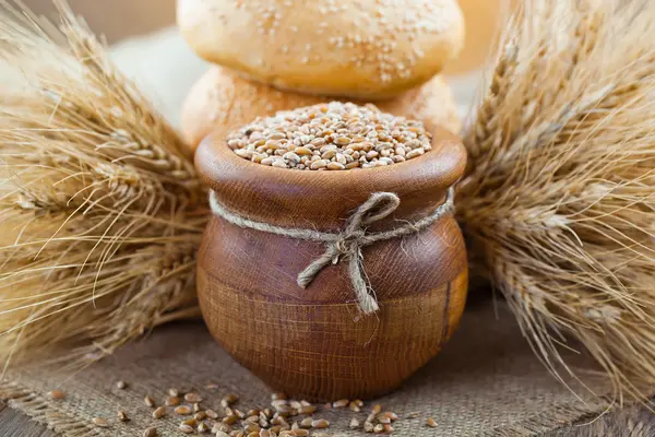 Bakery products and spikelets — Stock Photo, Image