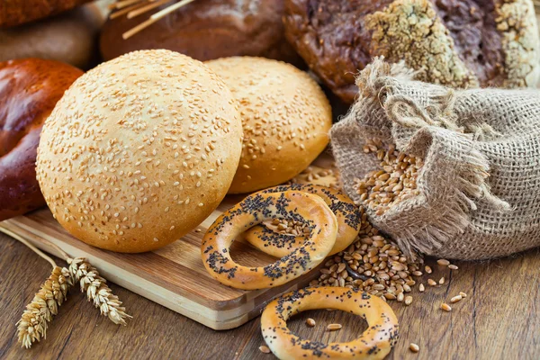 Bakery products and spikelets — Stock Photo, Image