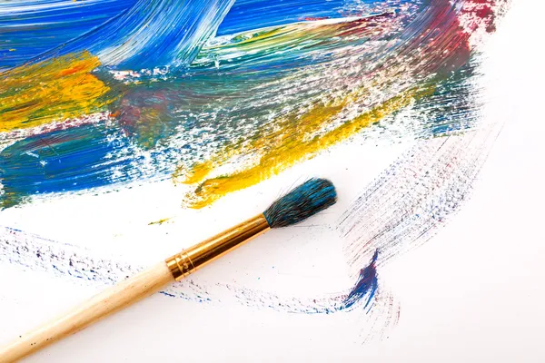 Paints and brushes in the composition — Stock Photo, Image