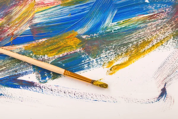 Paints and brushes in the composition — Stock Photo, Image