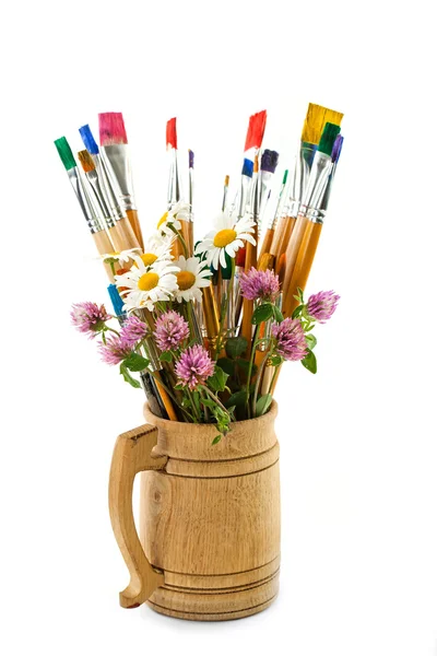 Paints and brushes in the composition — Stock Photo, Image