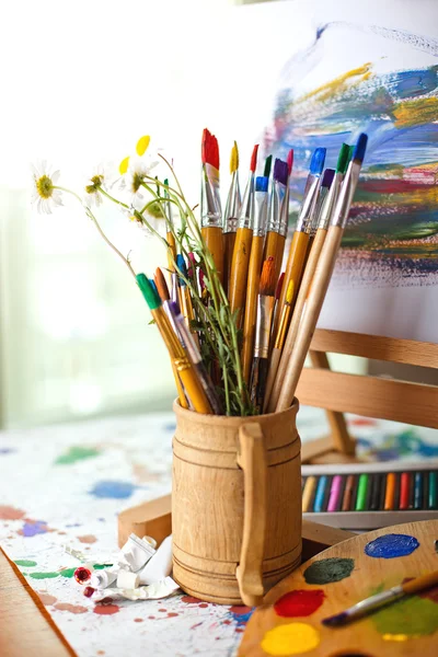 Paints and brushes — Stock Photo, Image