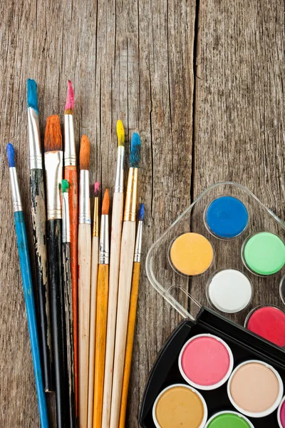 Paints and brushes — Stock Photo, Image