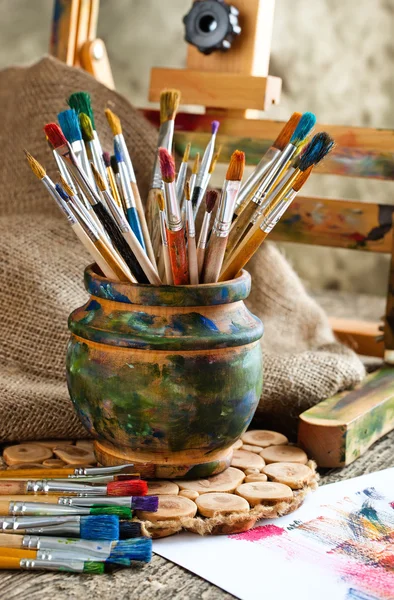 Paints and brushes — Stock Photo, Image