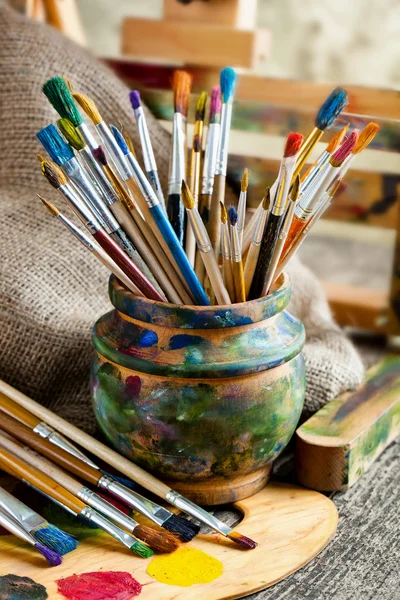 Paints and brushes — Stock Photo, Image