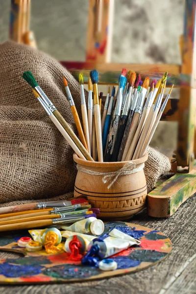 Paints and brushes — Stock Photo, Image