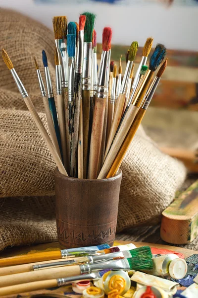 Paints and brushes — Stock Photo, Image