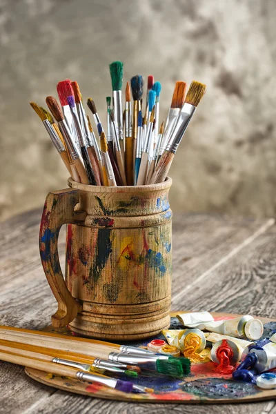 Paints and brushes — Stock Photo, Image