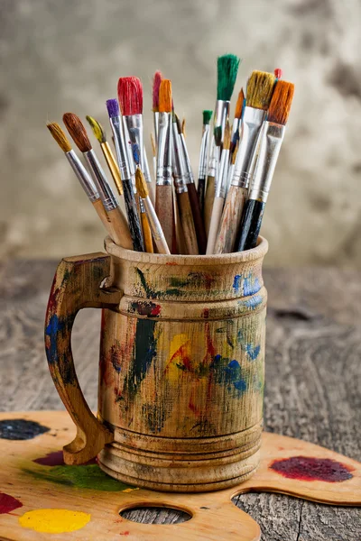 Paints and brushes — Stock Photo, Image