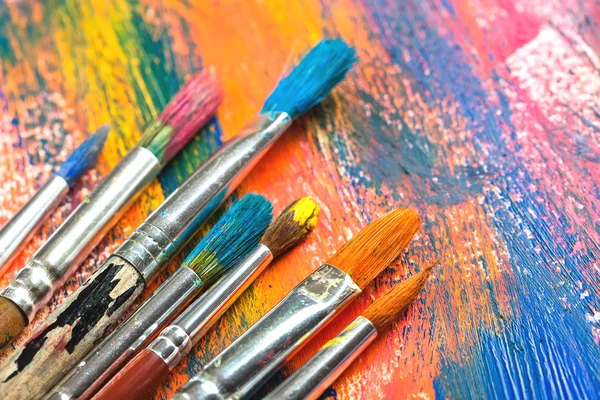 Paints and brushes — Stock Photo, Image