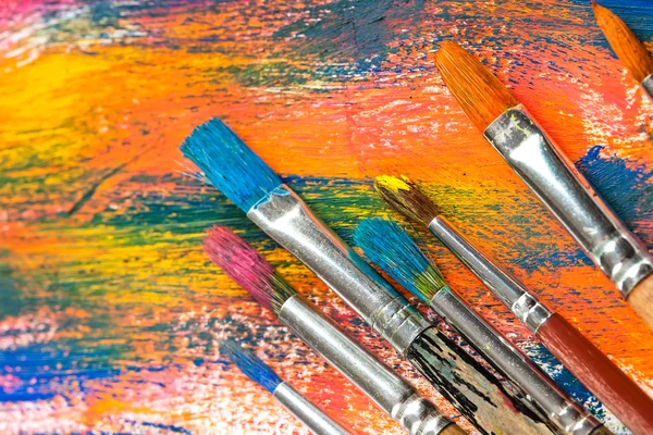 Paints and brushes — Stock Photo, Image