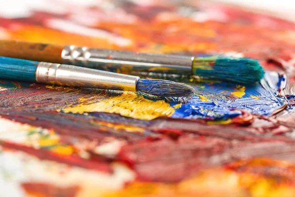 Paints and brushes — Stock Photo, Image