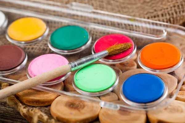 Paints and brushes — Stock Photo, Image