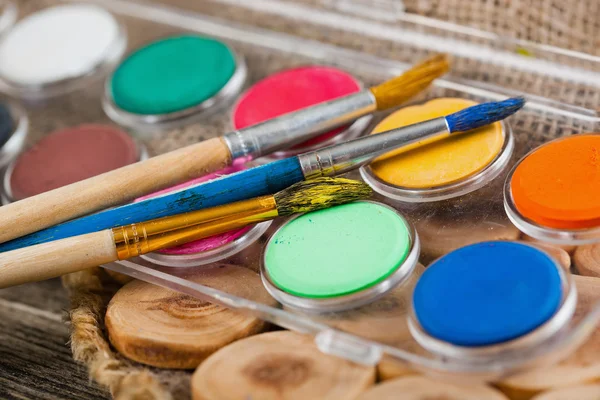 Paints and brushes — Stock Photo, Image