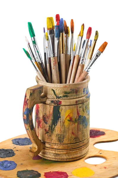 Paints and brushes — Stock Photo, Image