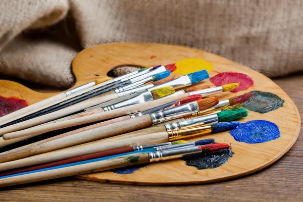 Paints and brushes — Stock Photo, Image