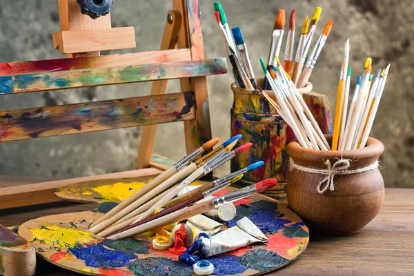 Paints and brushes — Stock Photo, Image