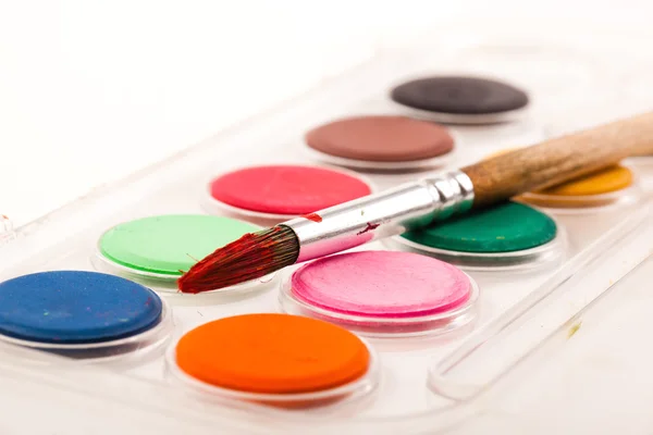 Paints and brushes — Stock Photo, Image