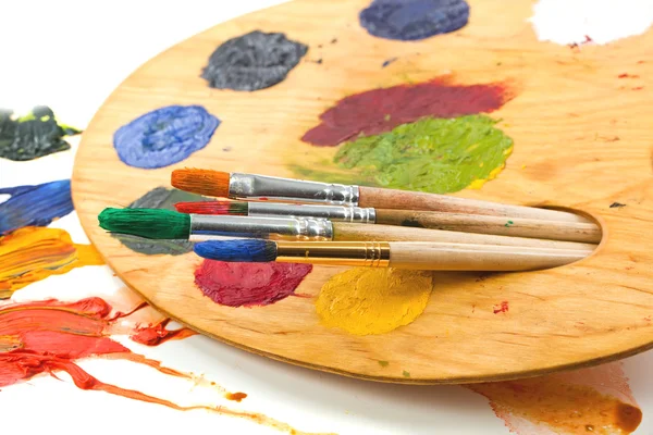 Paints and brushes — Stock Photo, Image