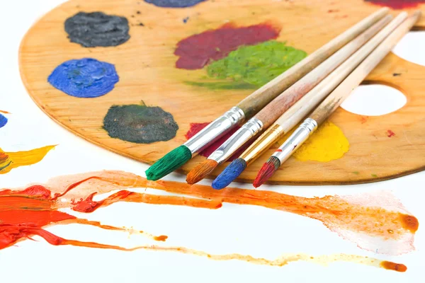 Paints and brushes — Stock Photo, Image