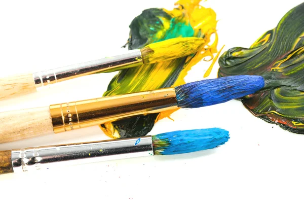 Paints and brushes — Stock Photo, Image