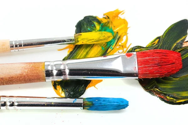 Paints and brushes — Stock Photo, Image