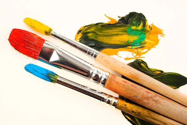 Paints and brushes — Stock Photo, Image